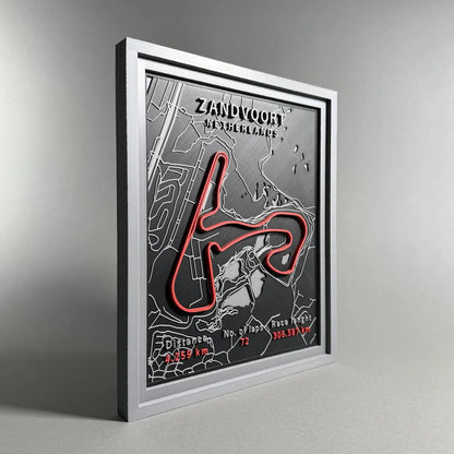 Framed map of Zandvoort with red design on a gray background