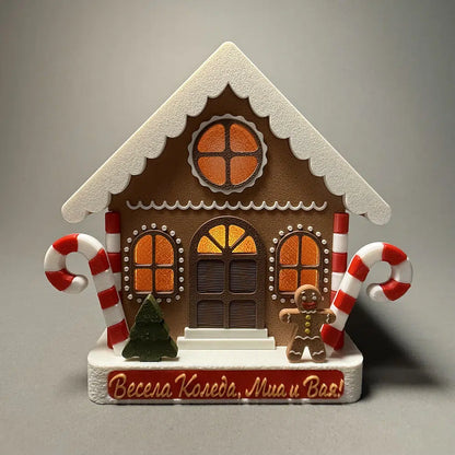 Decorative gingerbread house with candy canes and a gingerbread man and a light
