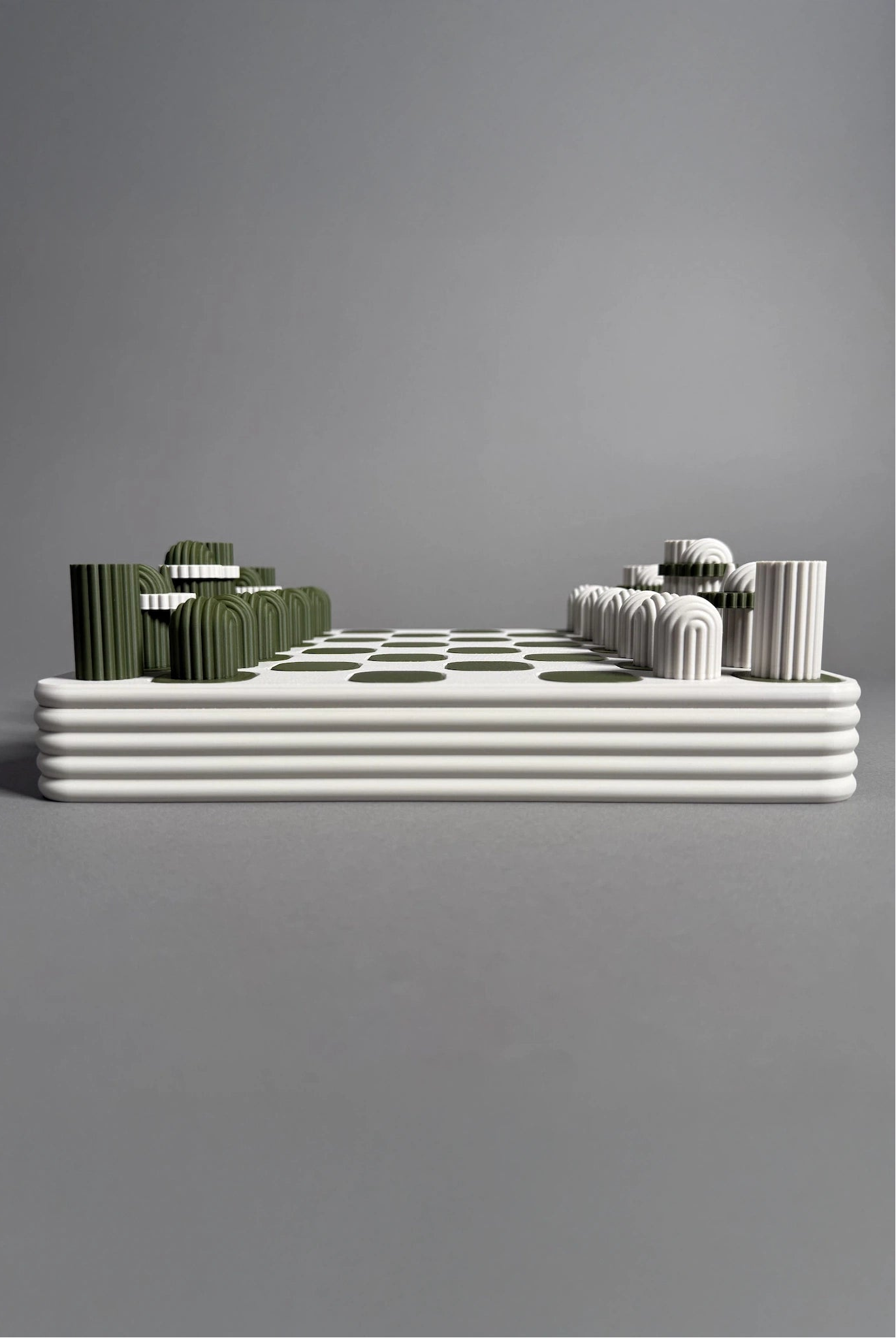 3d printed minimalistic chess in white and green