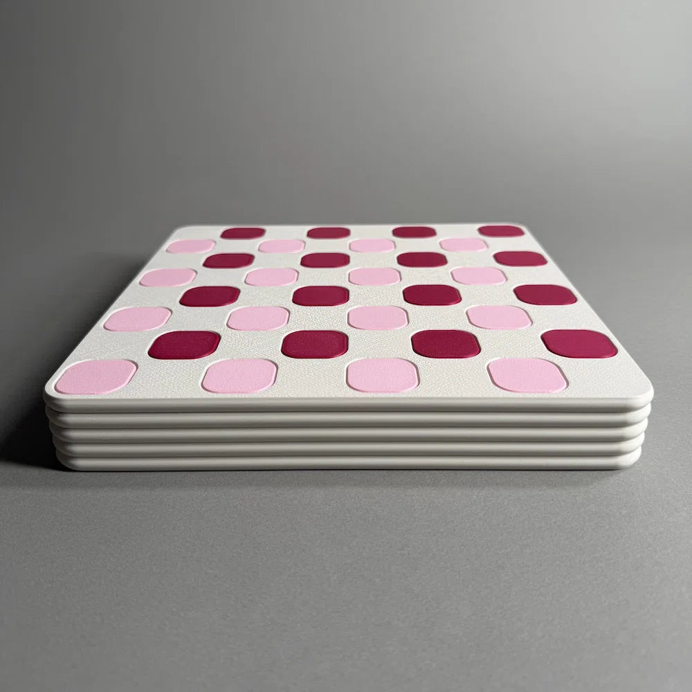 a side view of a pink 3d printed chess box