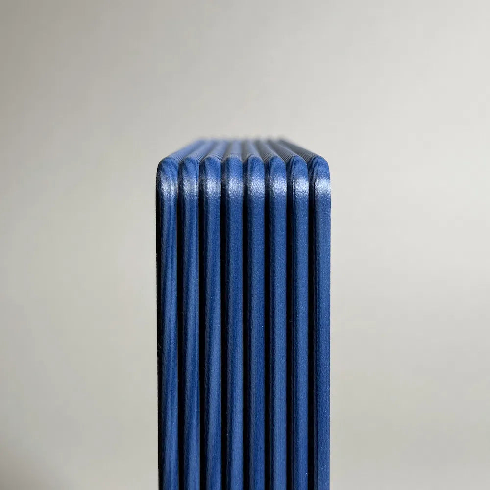 A blue litophane frame on a grey background by mads 3d prints